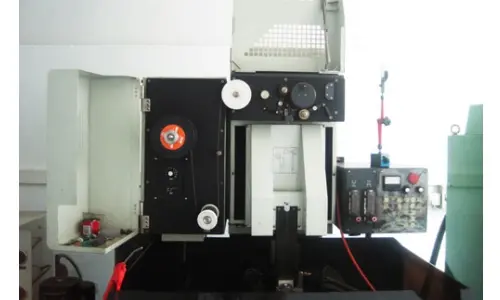 Wire-cutting EDM machine in operation at ShenZhen HUAKAIYU Technology Co., Ltd., a leading China precision plastic injection mould factory.